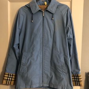 Blue Burberry rain coat with hood
